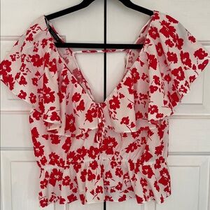 Zara White and red sleeveless V neck top with flounce.